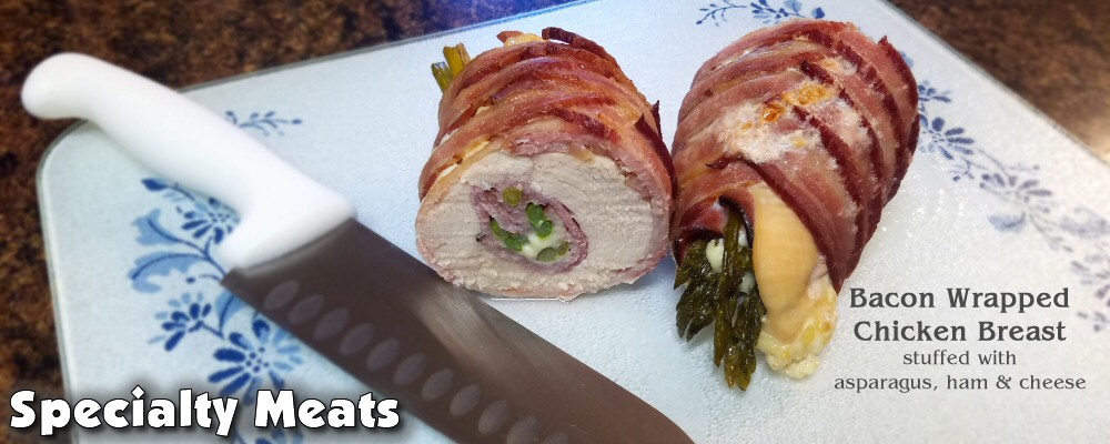 Specialty meats - Bacon wrapped chicken breast stuffed with asparagus and cheese